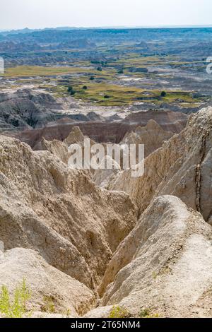 Erosion exposes colorful layers of sedimentary rock in the Badlands ...