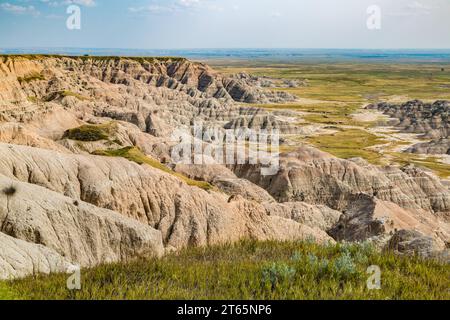 Erosion exposes colorful layers of sedimentary rock in the Badlands ...