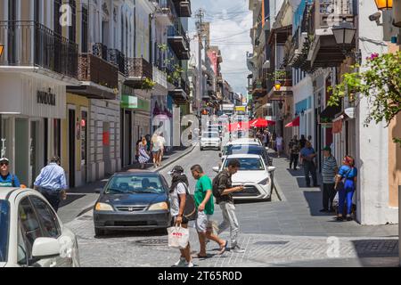 Cruise ship passengers shopping along Fortaliza Street in Old San Juan, Puerto Rico Stock Photo