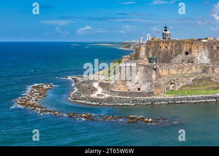 Thick walls and lighthouse of the Castillo San Felipe del Morro in San Juan, Puerto Rico Stock Photo