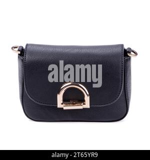 Modern black women's handbag in matte leather with gold details isolated on a white background. Close-up. Versatile accessories. Stylish fashionable m Stock Photo