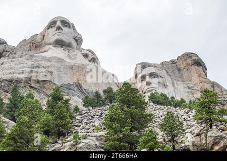 Carved granite busts of George Washington, Thomas Jefferson, Theodore Teddy Roosevelt and Abraham Lincoln at Mount Rushmore National Monument Stock Photo