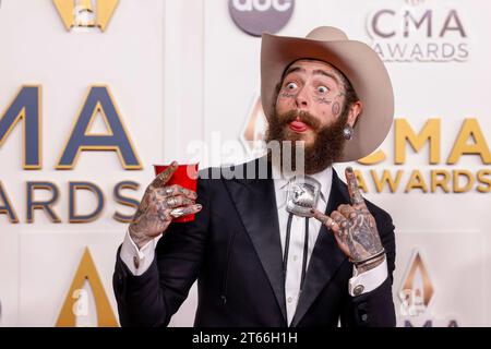 Nashville, United States. 08th Nov, 2023. Post Malone arrives on the red carpet with a red cup at the 57th Annual CMA Awards at Bridgestone Arena in Nashville, Tennessee, on Wednesday, November 8, 2023. Photo by John Angelillo/UPI Credit: UPI/Alamy Live News Stock Photo