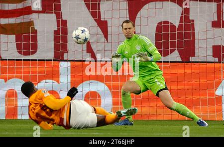 Munich, Germany. 8th Nov, 2023. Bayern Munich's goalkeeper Manuel Neuer (R) saves the ball during the UEFA Champions League Group A football match between Bayern Munich and Galatasaray in Munich, Germany, Nov. 8, 2023. Credit: Philippe Ruiz/Xinhua/Alamy Live News Stock Photo