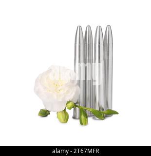 Bullets and beautiful flower isolated on white Stock Photo