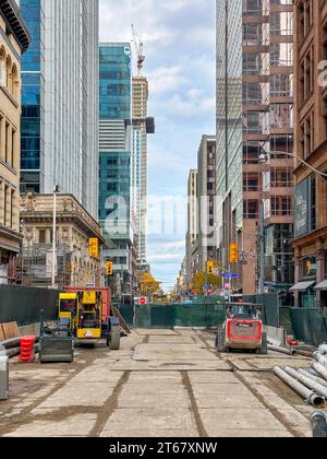 Construction site and equipment in the downtown district. Closure of Queen Street for the construction of the Ontario Line. Stock Photo