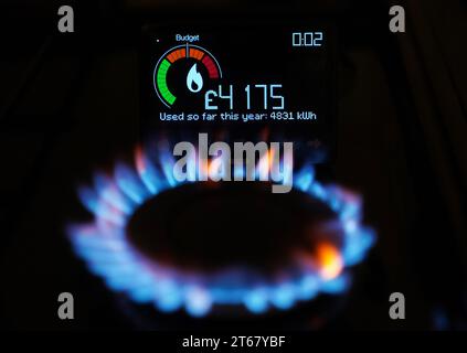 File photo dated 23/04/2022 of a handheld smart meter on a kitchen hob showing the cost of a year-to-date's worth of home energy usage in a home in Dorset. Six of Britain's biggest gas and electricity suppliers will pay out £10.8 million to the energy watchdog after failing to meet the first annual target under a government push to install smart meters across the UK. Ofgem said British Gas, Ovo, Bulb, E.On, Scottish Power and SSE fell short of the target for 2022 by more than a million smart meters - the first of the Government's four-year plan launched in January 2022. Issue date: Thursday No Stock Photo