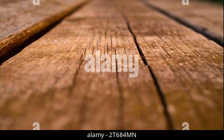 Wooden slats in warm tones with lots of texture and shallow depth of field. Background and template concept. Stock Photo