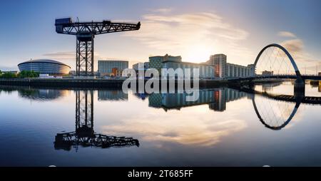 Glasgow skyline panorama at sunrise over river Clyde, Scotland Stock Photo