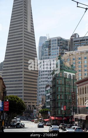 San Francisco, California - April 25, 2023: Low angle view of Transamerica Pyramid building against sky during sunny day Stock Photo