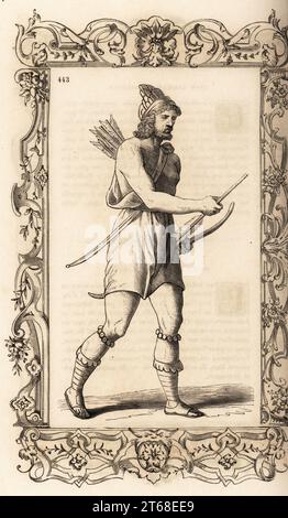 Costume of an African man, 16th century. Arab or Berber inhabitant of the desert of North Africa. In animal skin robe, with bow and arrows. Within a decorative frame engraved by H. Catenacci and Fellmann. Woodblock engraving by Gerard Seguin and E.F. Huyot after a woodcut by Christoph Krieger from Cesare Vecellios 16th century Costumes anciens et modernes, Habiti antichi et moderni di tutto il mondo, Firman Didot Ferris Fils, Paris, 1859-1860. Stock Photo