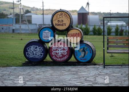 Patardzeuli, Georgia - October 7, 2023: Wooden barrels with traditional wine names at the KTW winery Stock Photo