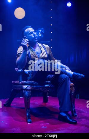 London, UK.  9 November 2023. Aaron Marshall, hand balancer, performs at a photocall for Olivier Award winning La Clique at Underbelly’s spiegeltent in Leicester Square.  The show opens to the public 15 November to 6th January 2024.  Credit: Stephen Chung / Alamy Live News Stock Photo