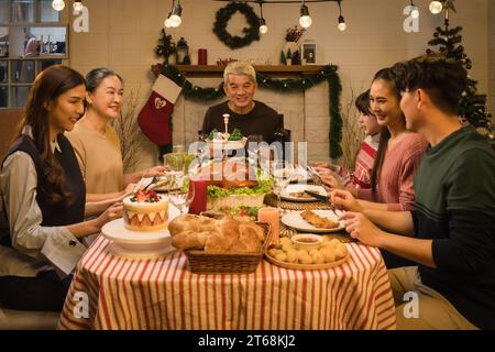 Asian family capturing the essence of Thanksgiving and Christmas