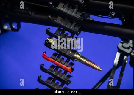 Close up of of bullets 11,8mm caliber in a coaxial machine gun, exposed at Military equipment international exhibition in Belgrade Stock Photo