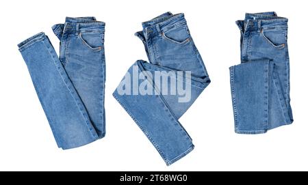 Denim set isolated, folded blue jeans pants collage over white Stock Photo