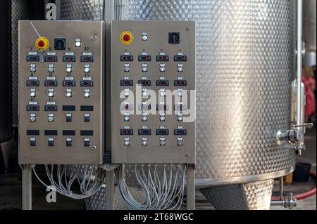 The central temperature control panel in a modern commercial wine making factory, Georgia Stock Photo