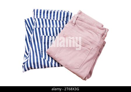 Two pair of folded casual pants on a white background top view Stock Photo