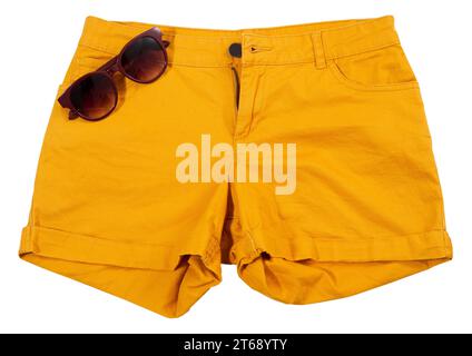 Orange shorts and sunglasses isolated on white background Stock Photo