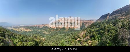 Beautiful Aerial panorama of mountain in forest.  Beautiful Aerial shot of Sahyadri mountain range located in Gujarat and Maharashtra border. Stock Photo