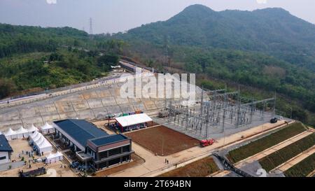 (231109) -- JAKARTA, Nov. 9, 2023 (Xinhua) -- This aerial photo taken on Nov. 9, 2023 shows the booster station of Cirata floating solar plant in West Java Province, Indonesia. Indonesian President Joko Widodo on Thursday inaugurated Southeast Asia's largest floating solar plant, which occupies an area of 250 hectares above the Cirata Reservoir in West Java Province. Spread over the reservoir surface with more than 340,000 solar panels, the 192-megawatt-peak capacity power plant can produce 300 million kilowatt hours of energy annually, complementing the hydropower generation available in th Stock Photo