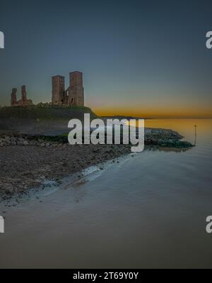 The view of Historic Reculver Towers at sunset. Kent, England Stock Photo