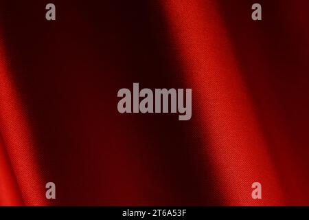 Background made wavy red linen fabric Stock Photo