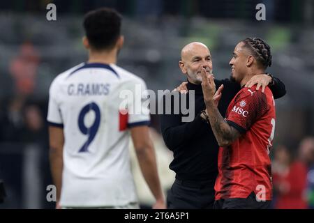 Milan, Italy. 7th Nov, 2023. Goncalo Ramos of PSG looks on as Stefano Pioli Head coach of AC Milan celebrates the 2-1 victory with Noah Okafor of AC Milan following the final whistle of the UEFA Champions League match at Giuseppe Meazza, Milan. Picture credit should read: Jonathan Moscrop/Sportimage Credit: Sportimage Ltd/Alamy Live News Stock Photo