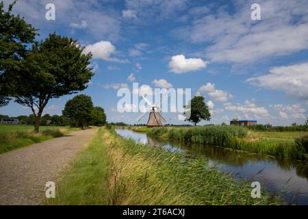 The Krimstermolen is a large polder mill north of the village of Zuidwolde in the municipality of Het Hogeland, province of Groningen, the Netherlands Stock Photo