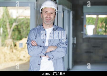 happy man worker on the construction site Stock Photo