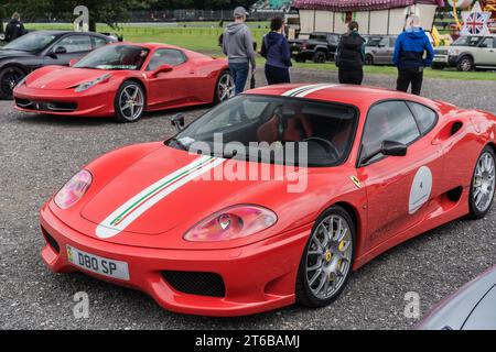 Tarporley, Cheshire, England, July 30th 2023. Red Ferrari 360 Challenge Stradale at a supercar meet, automotive lifestyle editorial illustration. Stock Photo