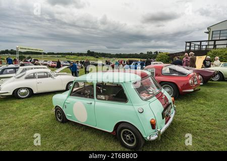 Tarporley, Cheshire, England, July 30th 2023. Austin Mini Cooper S at a classic car meet, automotive lifestyle editorial illustration. Stock Photo