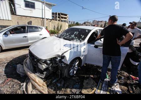 Tulkarm, Palestine. 08th Nov, 2023. People look at the car in which Israeli forces killed four Palestinian militants the day before in Tulkarem, West Bank. (Photo by Nasser Ishtayeh/SOPA Images/Sipa USA) Credit: Sipa USA/Alamy Live News Stock Photo