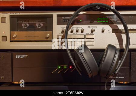 Sennheiser HD 300 stereo headphones with Harmon Kardon TD102 Cassette Deck, Monster Power Center HTS 2500. Stock Photo