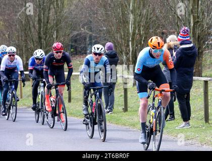 Zeb Kyffin, riding for Ribble Weldtite, pushes the pace as the lead group cross the finish line with one lap to go round the tough roads of the Goodwo Stock Photo
