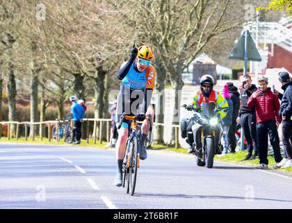 Zeb Kyffin, riding for Ribble Weldtite, celebrates winning solo having maintained the gap up the final climb of The Trundle,  RCR Fat Creations Goodwo Stock Photo