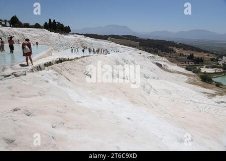 ANTALYA, TURKEY - MAY 15, 2021 Turquoise pools in travertine terraces at Pamukkale. Cotton castle in southwestern Turkiye Stock Photo