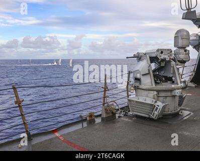 USS Benfold (DDG 65) fires its Mark 38 25mm gun as part of a live-fire gunnery exercise during Pacific Griffin 2021. (51283782505) Stock Photo