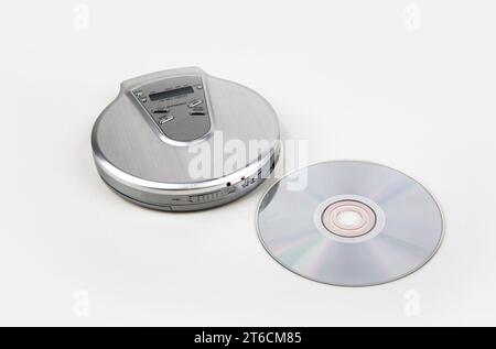 Open Portable Compact Disk Player with CD isolated on white background Stock Photo