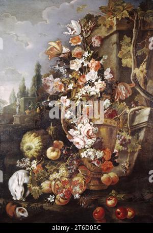 Still Life of Flowers and Fruits in a Garden, 1700-1710. A deceptively casual cascade of sweet-smelling roses, tulips, and other cultivated flowers combined with luscious, ripe fruit including a melon, grapes, and a pomegranate sliced open is set before a classicizing urn in an aristocratic garden, accompanied by a rabbit and guinea pig. Stock Photo