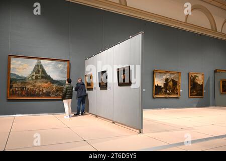 People looking at paintings in the Royal Museums of Fine Arts of Belgium (Musées royaux des Beaux-Arts de Belgique) – Brussels Belgium – October 2023 Stock Photo