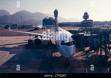 A air plane parked at the Hong Kong International Airpot Stock Photo