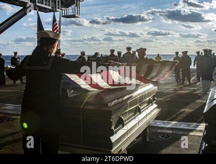 USS George H.W. Bush (CVN 77) holds a a burial at sea in the Atlantic Ocean. (51857294587) Stock Photo