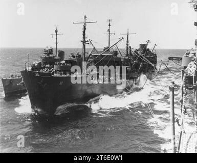 USS Guadalupe (AO-32) refuels USS Maury (DD-401) and USS Lexington (CV-16) in November 1943 Stock Photo