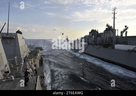 USS Jason Dunham receives fuel from USNS Bridge. (8408576734) Stock Photo