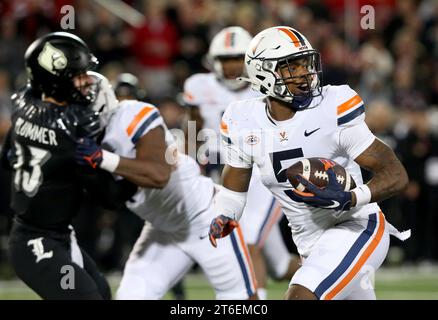 Louisville, United States. 09th Nov, 2023. Virginia Cavaliers Cam Robinson (5) runs back an interception for a touchdown against the University of Louisville during the second half of play at L&N Stadium on Thursday, November 8, 2023 in Louisville, Kentucky. Photo by John Sommers II/UPI Credit: UPI/Alamy Live News Stock Photo