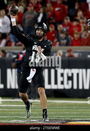 Louisville, United States. 09th Nov, 2023. University of Louisville quarterback Jack Plummer (13) throws under pressure from Virginia Cavaliers defense during the second half of play at L&N Stadium on Thursday, November 8, 2023 in Louisville, Kentucky. Photo by John Sommers II/UPI Credit: UPI/Alamy Live News Stock Photo