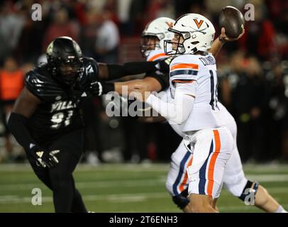 Louisville, United States. 09th Nov, 2023. Virginia Cavaliers quarterback Anthony Colandrea (10) throws under pressure from the University of Louisville defense during the first half of play at L&N Stadium on Thursday, November 8, 2023 in Louisville, Kentucky. Photo by John Sommers II/UPI Credit: UPI/Alamy Live News Stock Photo