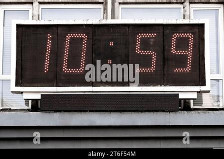 electronic board. Electronic watch, Digital  scoreboard. The concept of time, the beginning. Stock Photo