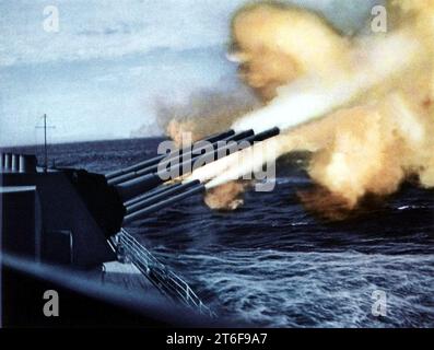 USS Rochester (CA-124) firing on targets in Korea, circa in 1952 Stock ...